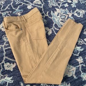 Worn Brown skinny pants. cute.